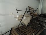 a rack that has a bag on top of it