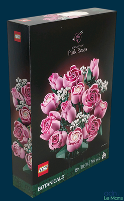 a box with a bunch of pink roses in it
