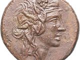 an ancient coin with a woman ' s face on it