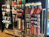 a large display of socks and socks in a store