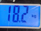 a close up of a digital clock on a table