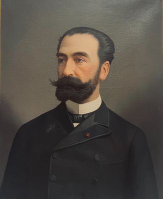 portrait d'un homme moustachu et barbu en costume