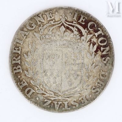 an old silver coin with a coat of arms on it
