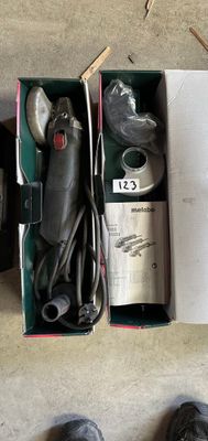 a pair of shoes that are next to a box of hair dryers