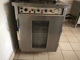 an image of a kitchen with a stove and oven