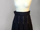 an image of a mannequin with a skirt on a mannequin stand