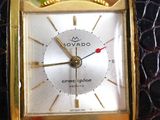 an image of a close up of a wrist watch on a table