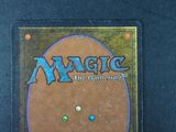 a close up of a card with a picture of a face on it