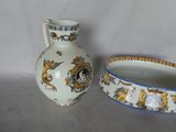 two vases sitting next to each other on a table