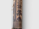 a wooden pole with a clock on it and a clock on the wall