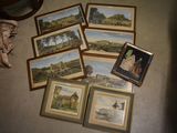 a lot of paintings that are on the floor