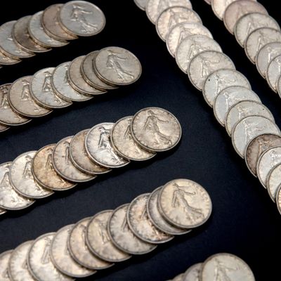 a lot of coins that are on a table