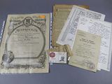 some old papers and papers are sitting on a table