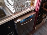 a dishwasher and a dishwasher in a kitchen