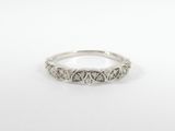 a white gold wedding band with diamonds on it
