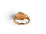 a close up of a gold ring on a white background