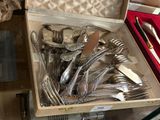 a box of silverware that is sitting on a table