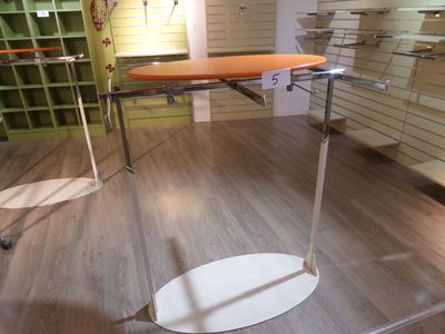 an image of a room with a table and shelves