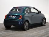 an image of a small blue car parked in a room