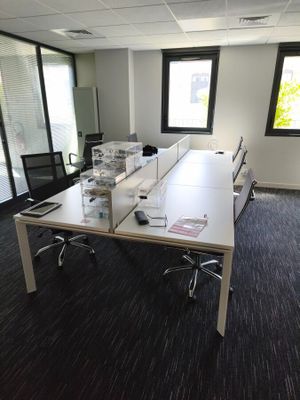 an image of a conference room with a table and chairs