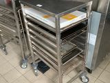 many trays of food in a commercial kitchen