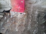 a lot of empty wine glasses on the table