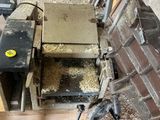 a picture of a pile of wood that is sitting on the ground