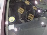 a car that has a bunch of stickers on it