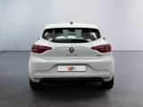 the rear end of a white car in a white room