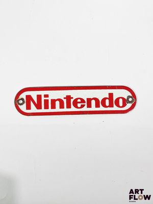a nintendo logo on the back of a nintendo wii game console