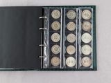 a book with a bunch of coins inside of it