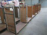 many wooden boxes lined up in a warehouse