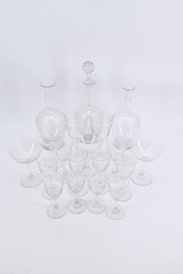 a lot of empty wine glasses sitting on a table