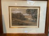 framed picture of a landscape with trees and a river