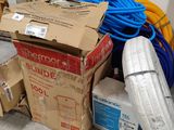 a box of hoses and a box of hoses on the ground
