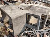 a pile of rubble on the ground next to a building