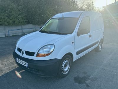 a white van that is parked in a parking lot