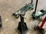 a lot of tools sitting on the floor in a garage