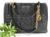 michael korsch black quilted tote bag with gold hardware