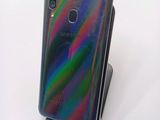 the back of a samsung galaxy s9 phone with a rainbow - colored cover