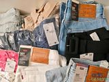 a pile of assorted clothing on a table