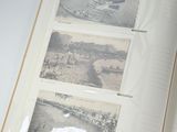a book opened to show pictures of boats on the water