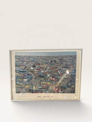 an aerial view of a city with a plane flying over it