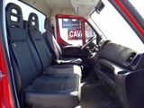 a red truck with black seats and a red sign in the back of the truck