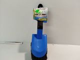 a blue brush that is sitting on top of a counter