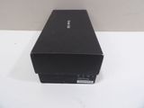 an empty black box sitting on top of a white table