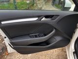 the interior of a car with the door open and the driver ' s side door open