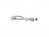 pair of pearl earrings on a white background