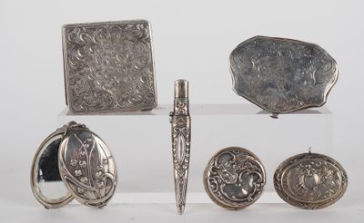 a lot of silver items that are sitting on a table