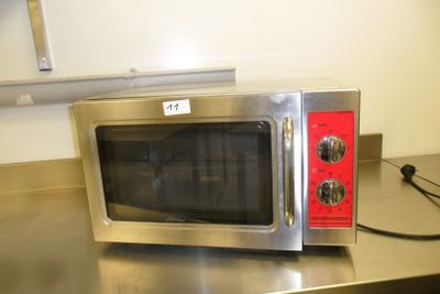 a microwave sitting on a counter in a kitchen